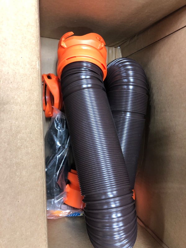 Photo 2 of Camco 20' (39742) RhinoFLEX 20-Foot RV Sewer Hose Kit, Swivel Transparent Elbow with 4-in-1 Dump Station Fitting-Storage Caps Included , Black , Brown 20ft Sewer Hose Kit Frustration-Free Packaging