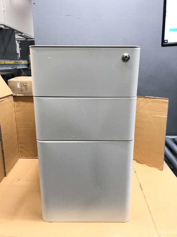 Photo 2 of DEVAISE 3-Drawer Slim Vertical File Cabinet, Fully Assembled Except Casters, Legal/Letter Size, White White 11.8"W x 17.7"D x 23.2"H