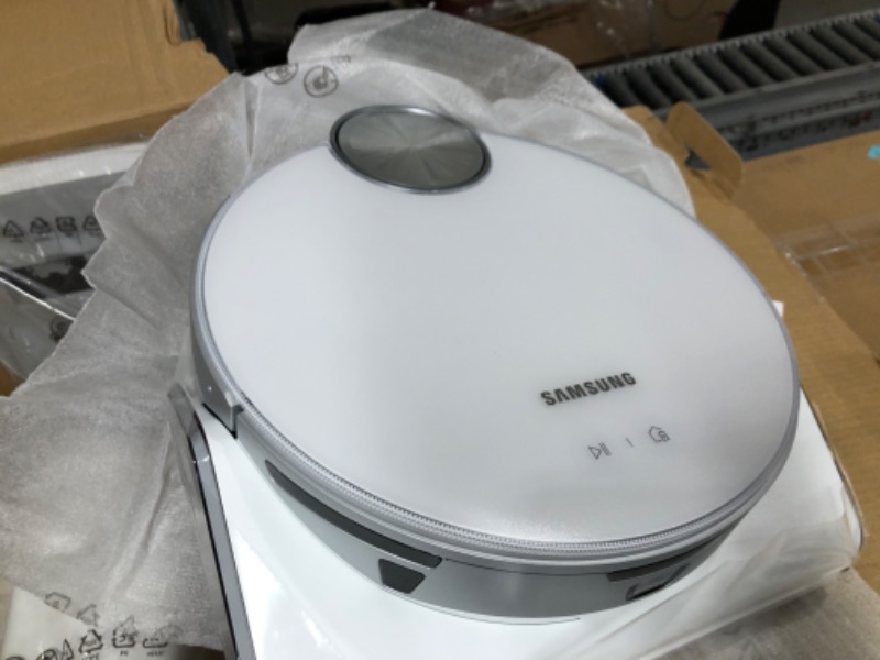 Photo 12 of **CHARGED , TESTED , AND FUNCTIONAL***
SAMSUNG Jet Bot AI+ Robot Vacuum Cleaner w/ Object Recognition, Intelligent Cleaning, Clean Station, 5-Layer Filter, Touchless Dust Removal for Hardwood Floors, Carpets, VR50T95735W, White