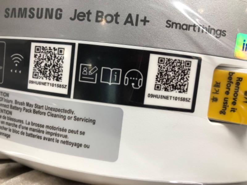 Photo 1 of **CHARGED , TESTED , AND FUNCTIONAL***
SAMSUNG Jet Bot AI+ Robot Vacuum Cleaner w/ Object Recognition, Intelligent Cleaning, Clean Station, 5-Layer Filter, Touchless Dust Removal for Hardwood Floors, Carpets, VR50T95735W, White