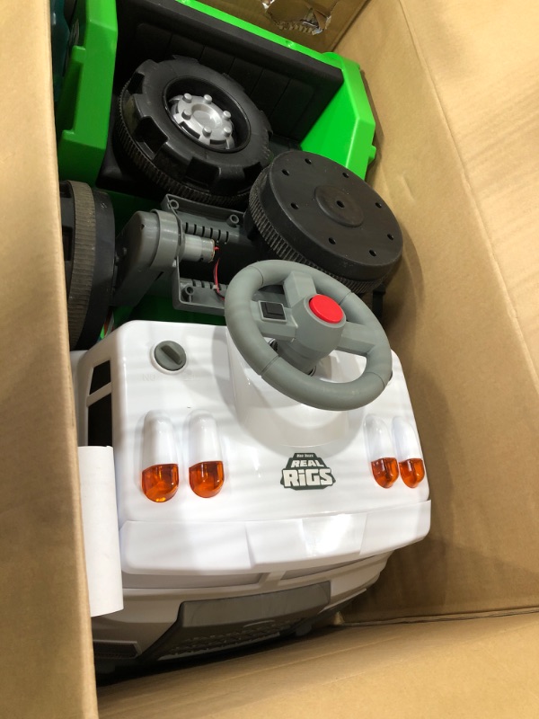 Photo 3 of *** USED ***  ****UNABLE TO TEST ****
Kid Trax Real Rigs Toddler Recycling Truck Interactive Ride On Toy, Kids Ages 1.5-4 Years, 6 Volt Battery and Charger, Sound Effects, 9 Recycling Accessories Included