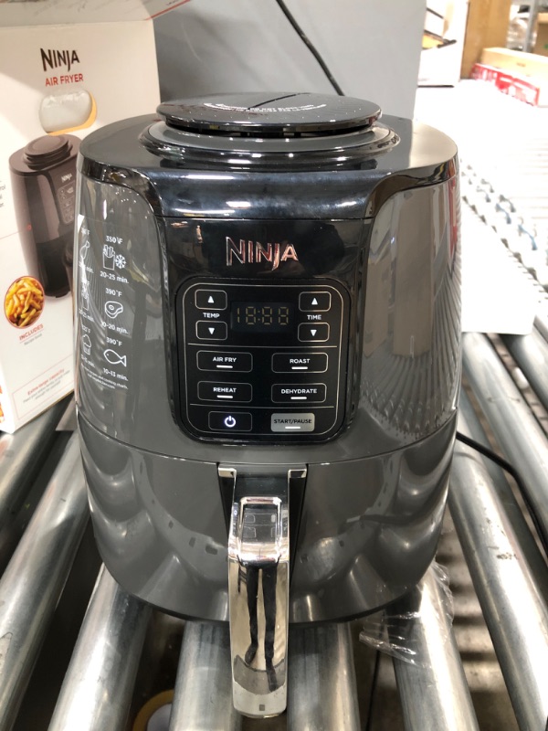 Photo 2 of *** USED *** **** TESTED POWERED ON ****
Ninja AF101 Air Fryer that Crisps, Roasts, Reheats, & Dehydrates, for Quick, Easy Meals, 4 Quart Capacity, & High Gloss Finish, Black/Grey 4 Quarts