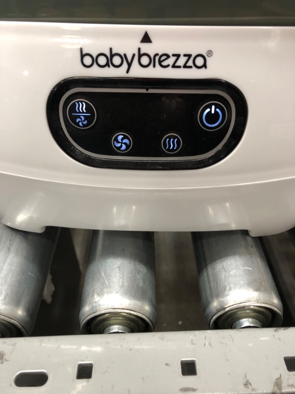 Photo 4 of Baby Brezza Baby Bottle Sterilizer and Dryer Advanced – Electric Steam Sterilization Machine – Universal Sterilizing for All Bottles: Plastic + Glass + Pacifiers + Breast Pump Parts - HEPA Filtration
