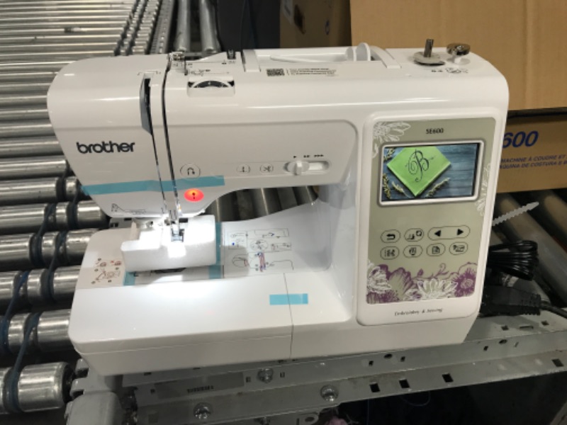 Photo 6 of  **** NEW**** TESTED*** Brother SE600 Sewing and Embroidery Machine, 80 Designs, 103 Built-In Stitches, Computerized, 4" x 4" Hoop Area, 3.2" LCD Touchscreen Display, 7 Included Feet