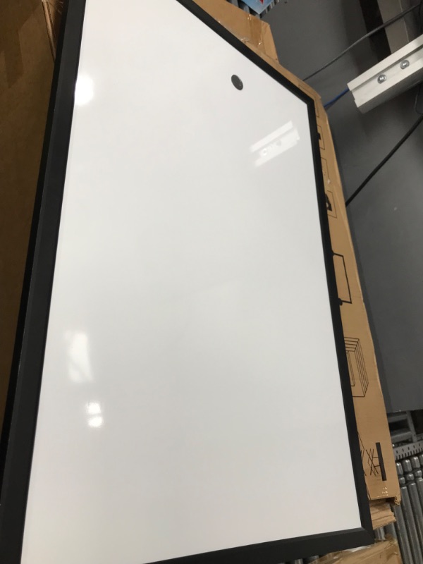 Photo 3 of Amazon Basics Magnetic Dry Erase White Board, 35 x 23-Inch Whiteboard - Black Wooden Frame 23"x35" Magnetic, Wood Frame