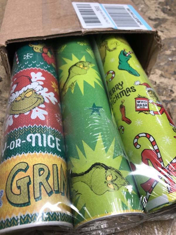 Photo 2 of American Greetings Christmas Wrapping Paper with Cut Lines Bundle, The Grinch (3 Rolls, 105 sq. ft.)