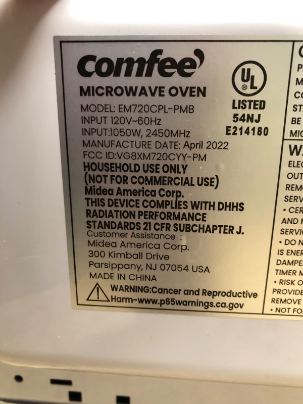 Photo 3 of **** NEW **** *** SHIPPING DAMAGE AS IS ***
COMFEE' EM720CPL-PMB Countertop Microwave Oven with Sound On/Off, ECO Mode and Easy One-Touch Buttons, 0.7cu.ft, 700W, Black Black Microwave