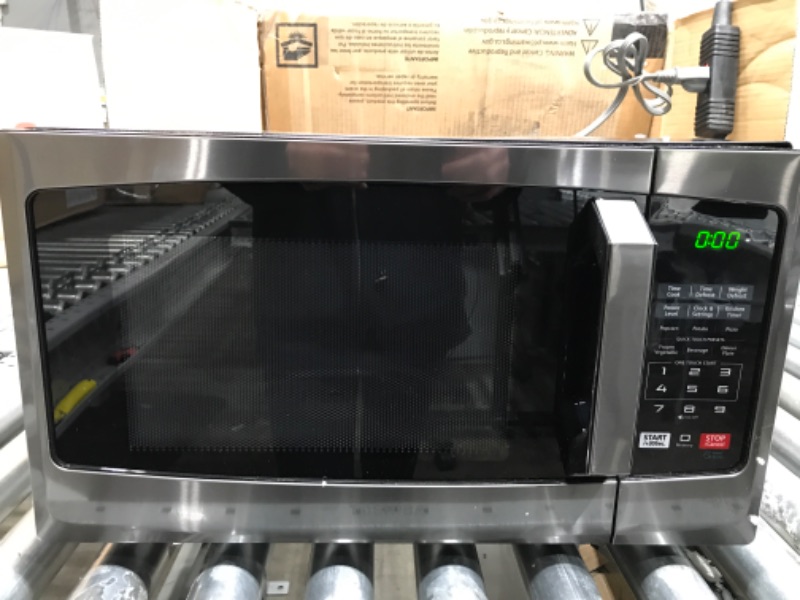 Photo 3 of *Major Damage-See Photos/Functional** toshiba em925a5a-bs microwave oven with sound on/off eco mode and led lighting, 0.9 cu.ft, black stainless