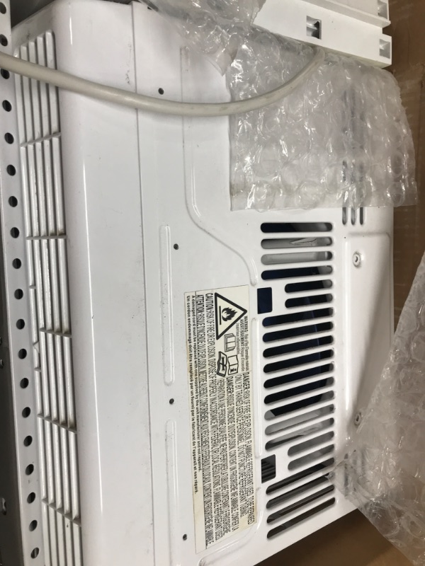 Photo 1 of Amazon Basics Window-Mounted Air Conditioner with Mechanical Control - Cools 150 Square Feet, 5000 BTU, AC Unit