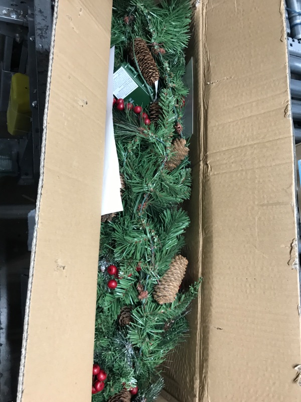 Photo 1 of 9 ft. Crestwood Spruce Garland with Battery Operated Warm White LED Lights