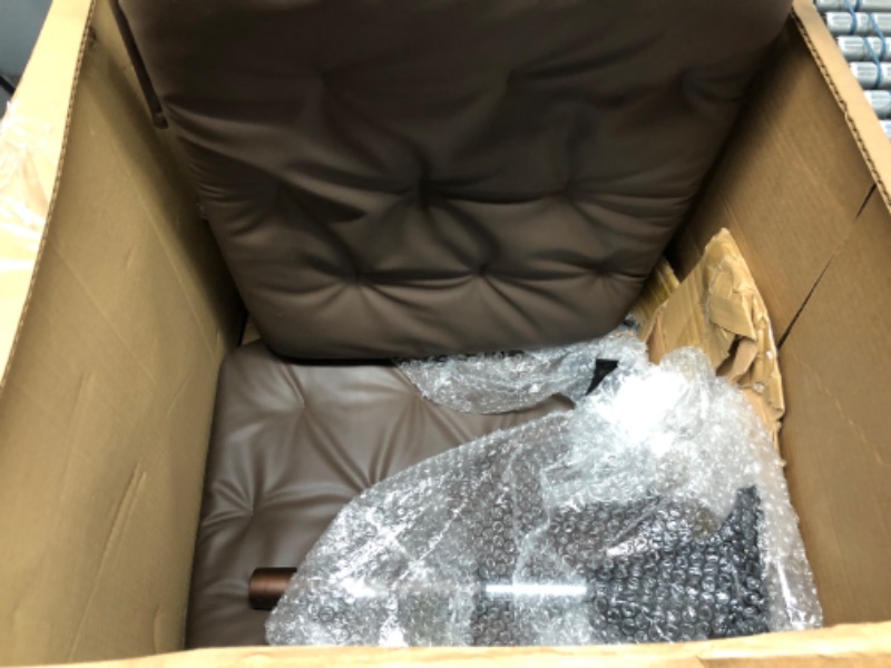 Photo 1 of brown leather rolling chair