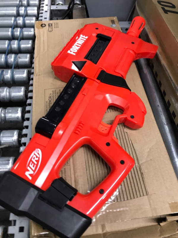 Photo 2 of ***MISSING BULLETS***
NERF Fortnite Compact SMG Motorized Blaster, Ultra Red Wrap Design, 8-Dart Internal Clip, 8 Elite Foam Darts, Electric Semi Auto Fortnite Toy Blaster