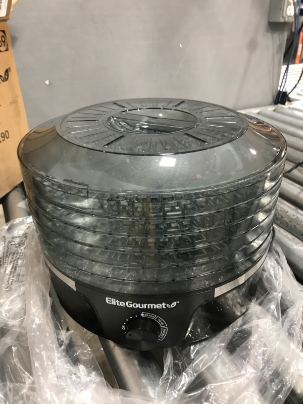 Photo 1 of Elite Gourmet EFD319DKG Food Dehydrator, 5 BPA-Free 11.4" Trays Adjustable Temperature Controls, Jerky, Herbs, Fruit, Veggies, Dried Snacks, Black and Grey
