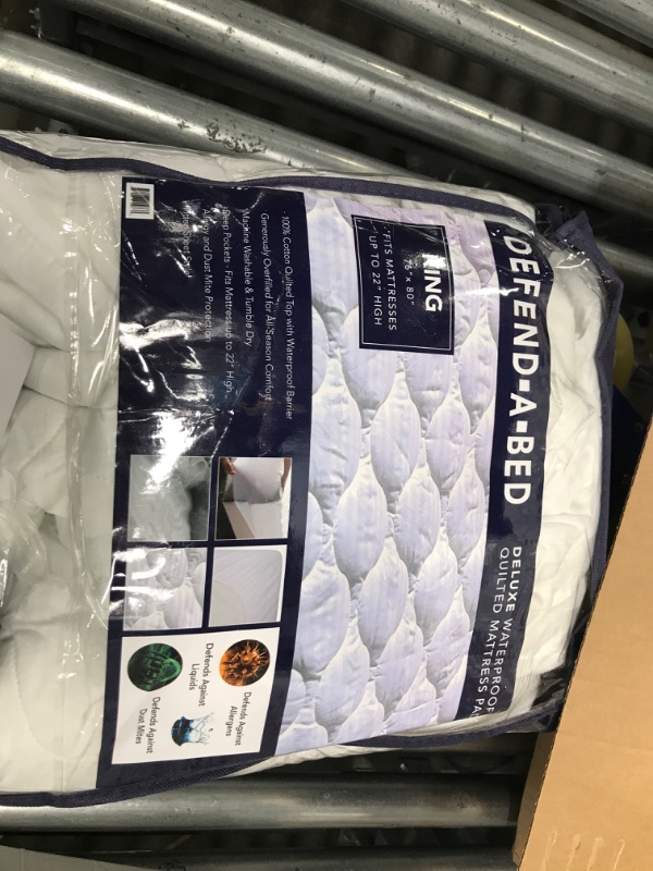Photo 1 of **PROTECTOR NEEDS TO BE WASHED**
Classic Brands Defend-A-Bed Deluxe Quilted Waterproof Mattress Protector, King