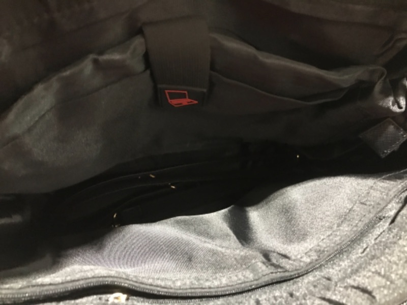 Photo 1 of MEDIUM BLACK LAPTOP PURSE 
