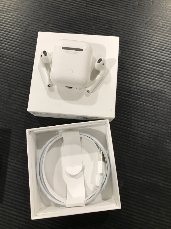 Photo 2 of Apple AirPods (2nd Generation) MV7N2AM/a with Charging Case - Stereo - Wireless - Bluetooth - Earbud - Binaural - in-ear