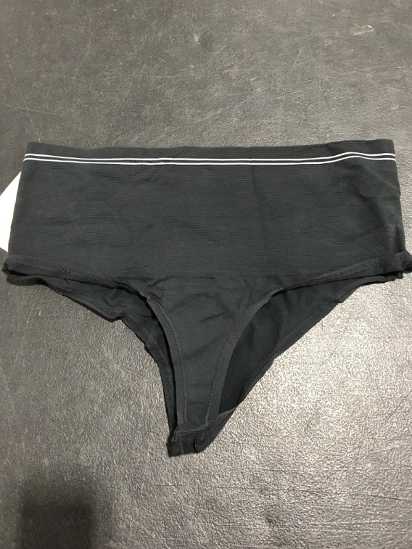 Photo 2 of Yummie Women's Cotton Seamless Shapewear Thong. BLACK. SIZE L/XL. 
