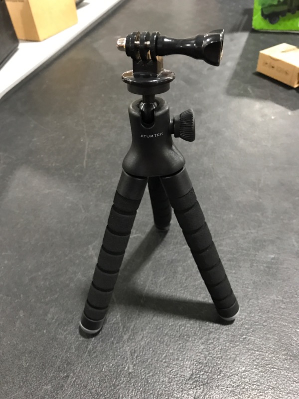 Photo 3 of Phone Tripod, Flexible Tripod for iPhone and Android Cell Phone, Portable Small Tripod with Wireless Remote and Clip for Video Recording/Vlogging/Selfie. MISSING BOX. PRIOR USE. 
PHOTO FOR REFERENCE,MAY VARY SLIGHTLY. 