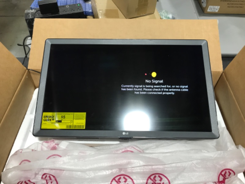 Photo 2 of LG 24LM530S-PU 23.6" Smart LED-LCD TV - HDTV - LED Backlight - YouTube, Amazon Prime - 1366 X 768 Resolution. OPEN BOX. POWERS ON, GOOD WORKING ORDER. PRIOR USE. 
