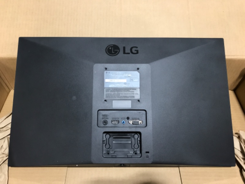 Photo 4 of Lg Consumer - 27" 1920x1080 Fhd Ips (2537642). OPEN BOX. MISSING REMOTE CONTROL. PRIOR USE. POWERS ON/FUNCTIONING. STICKER RESIDUE ON BACK. 
