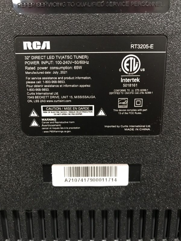 Photo 7 of RCA 32" Class HD (720P) LED TV (RLDED3258A). OPEN BOX. PRIOR USE AS DISPLAY. POWERS ON. FUNCTIONING. DAMAGE AT TOP FRONT EDGE. INCLUDES REMOTE & STAND. 
