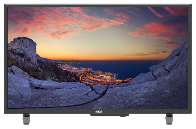 Photo 1 of RCA 32" Class HD (720P) LED TV (RLDED3258A). OPEN BOX. PRIOR USE AS DISPLAY. POWERS ON. FUNCTIONING. DAMAGE AT TOP FRONT EDGE. INCLUDES REMOTE & STAND. 
