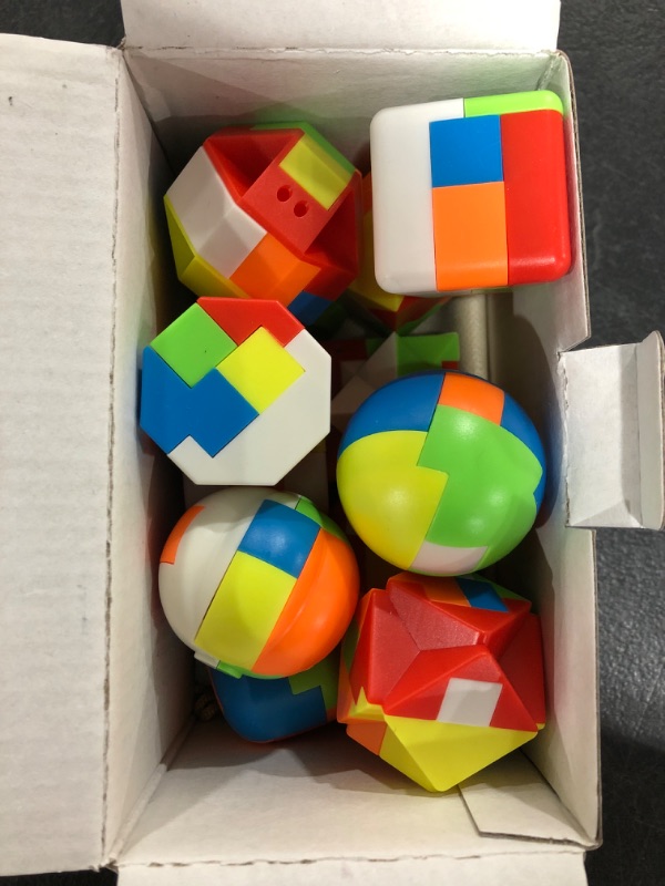 Photo 1 of BRAIN TEASER PUZZLES SET. AGES 8+. 