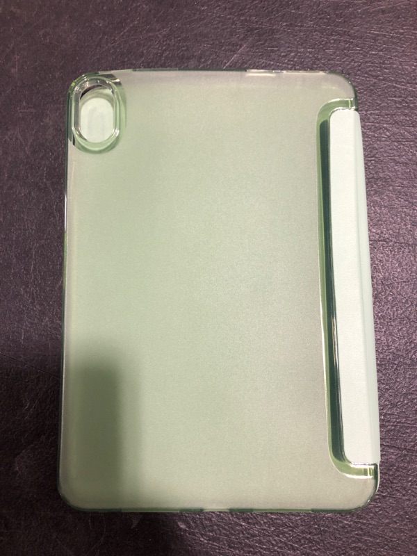 Photo 2 of SMALL TABLET CASE. GREEN. UNKNOWN APPLICATION. PRIOR USE. 