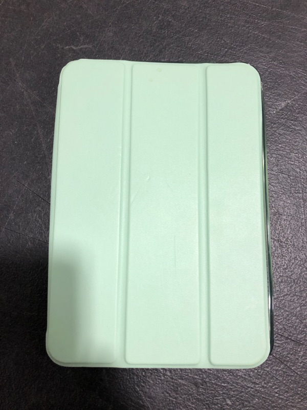 Photo 1 of SMALL TABLET CASE. GREEN. UNKNOWN APPLICATION. PRIOR USE. 