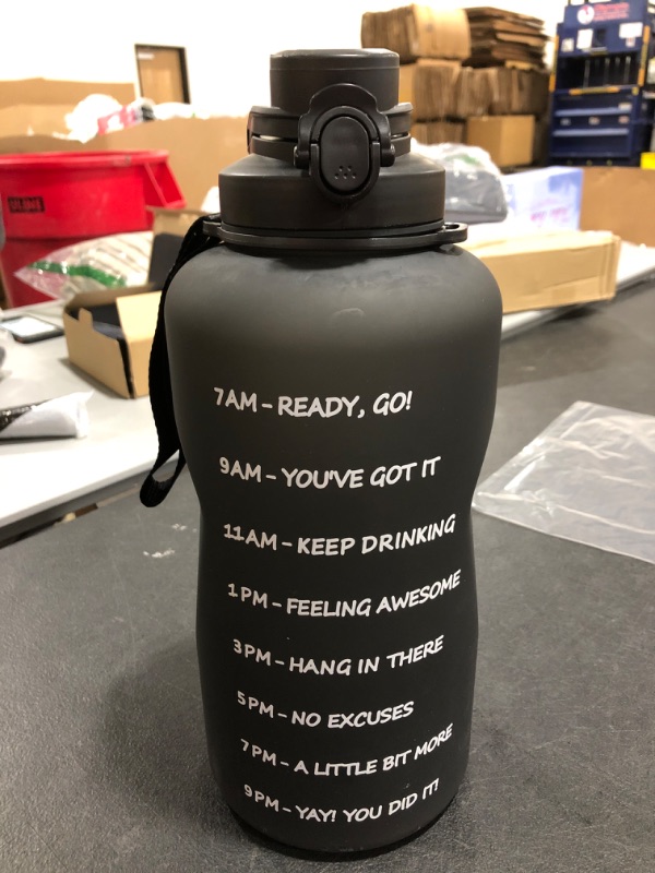 Photo 1 of 1 GALLON WATER BOTTLE. BLACK. PRIOR USE. 