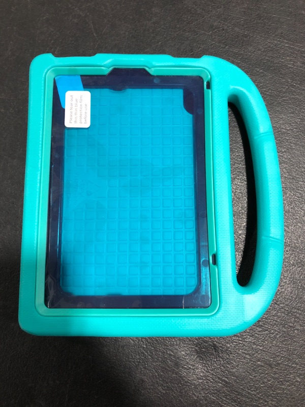 Photo 1 of CHILDREN'S TABLET CASE. TEAL COLOR. UNKNOWN APPLICATION. PRIOR USE.