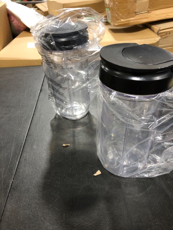 Photo 1 of 2 PLASTIC CUPS WITH HANDLES AND LIDS