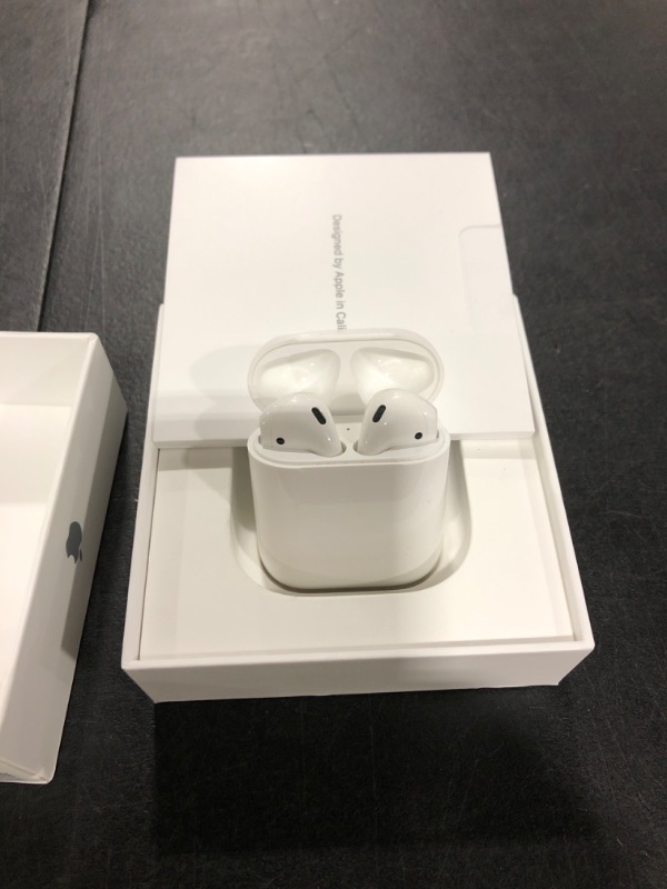 Photo 2 of Apple AirPods with Charging Case (Latest Model)