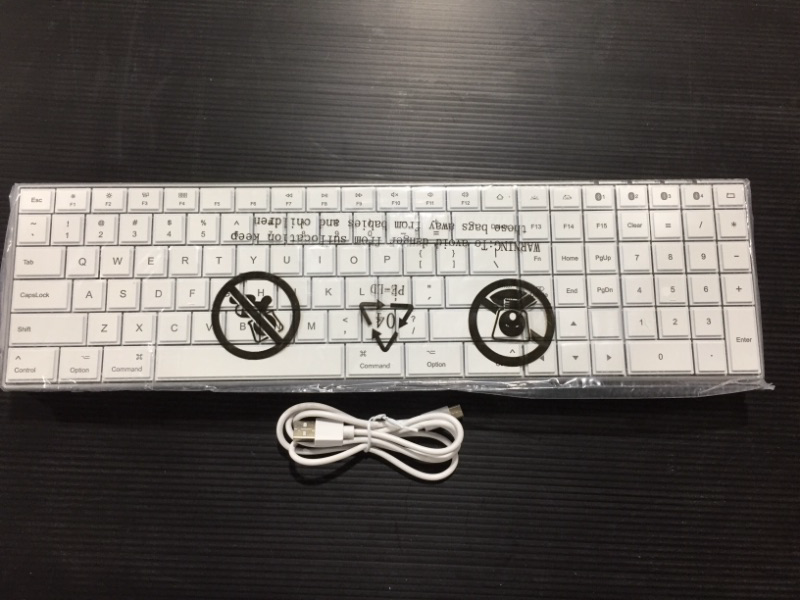 Photo 1 of WHITE JELLY COMB WIRELESS KEY BOARD 