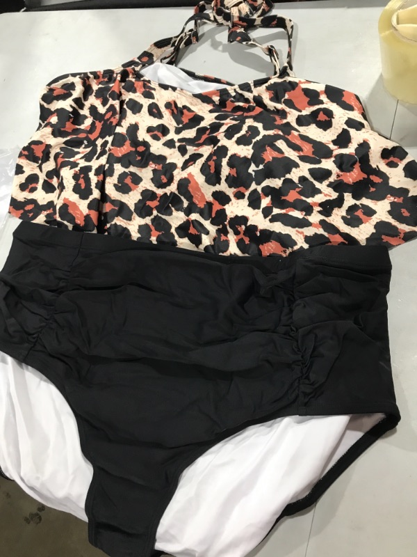 Photo 1 of 2 piece black and cheetah print bathing suit 