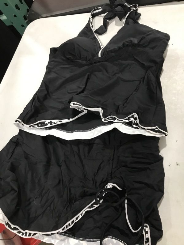 Photo 1 of 2 piece Black and white swiming suit Size M