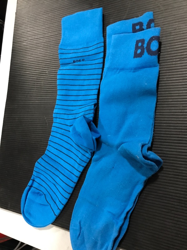 Photo 1 of 2 pairs of boss blue socks\
Size 6-8