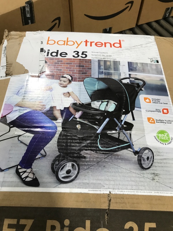 Photo 2 of Baby Trend EZ Ride 35 Travel System, Doddle Dots Blue (1850380)