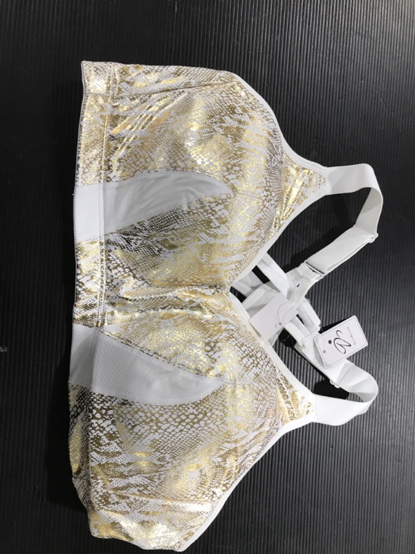 Photo 1 of zero bound sports bra WHITE AND GOLD- SIZE 38D