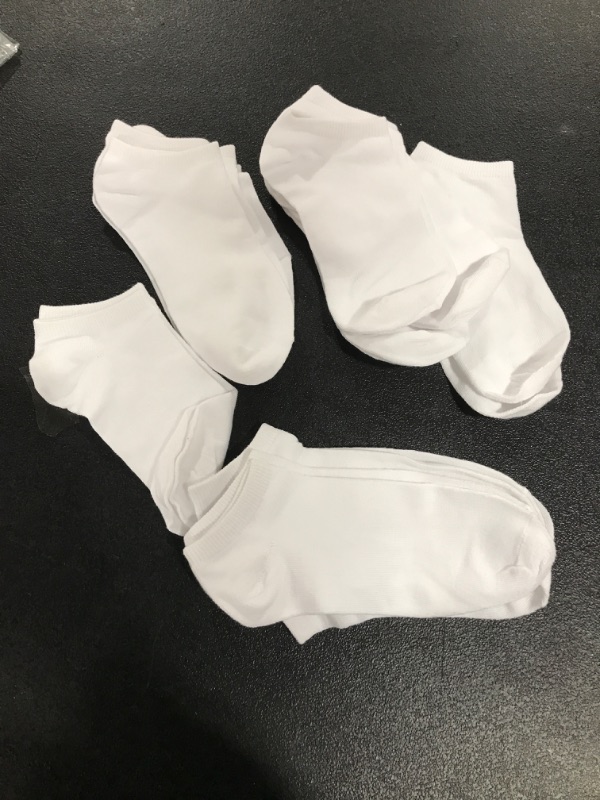 Photo 1 of 10 pairs of thin no shoe socks 
***No size listed***
