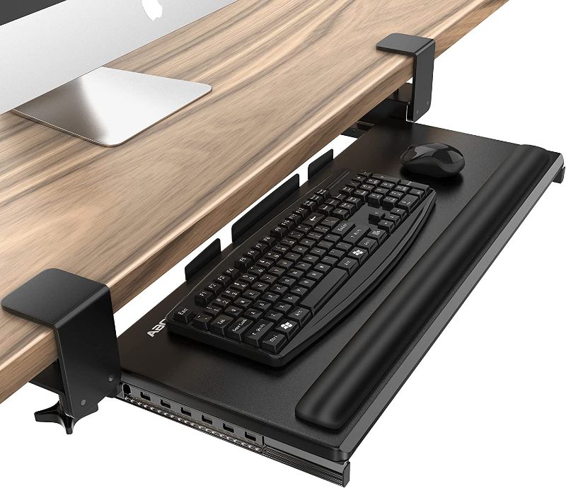 Photo 1 of AboveTEK Large Keyboard Tray Under Desk with Wrist Rest, 26.7"×11" Ergonomic Desk Computer Keyboard Stand with Sturdy C Clamp Mount System, Slide-Out Drawer Keyboard Mouse Holder for Office(Black)
