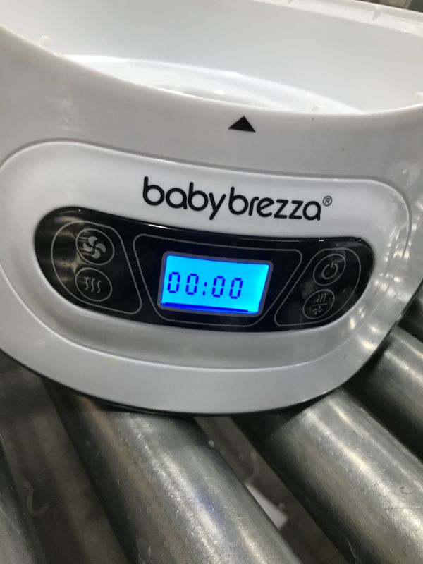 Photo 3 of Baby Brezza Baby Bottle Sterilizer and Dryer Machine – Electric Steam Sterilization - Universal Fit - Pacifiers, Glass, Plastic, and Newborn Feeding Bottles
