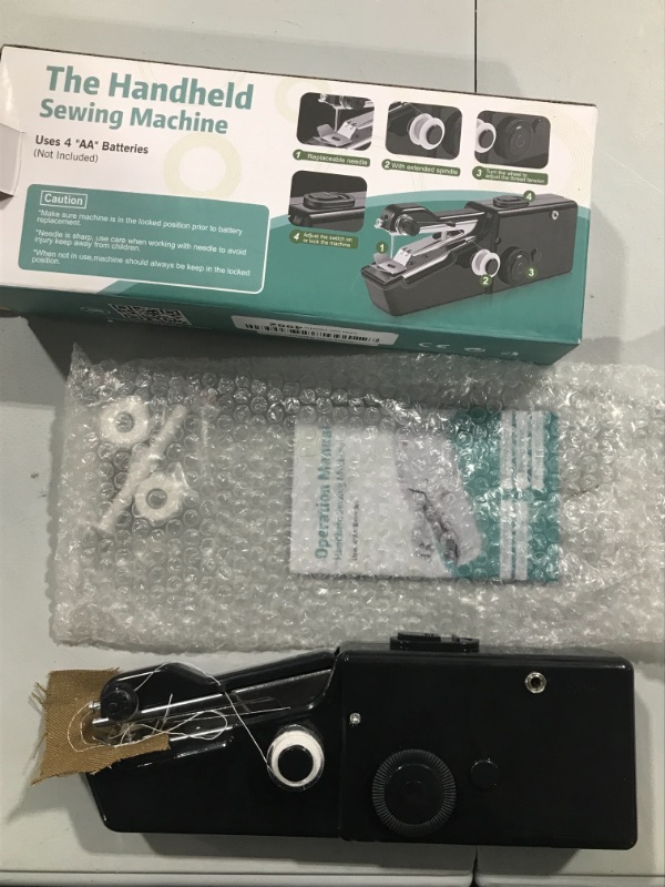 Photo 1 of Black Handheld Sewing Machine, Mini Portable Electric Sewing Device for Adults, Cordless Sewing Machine 