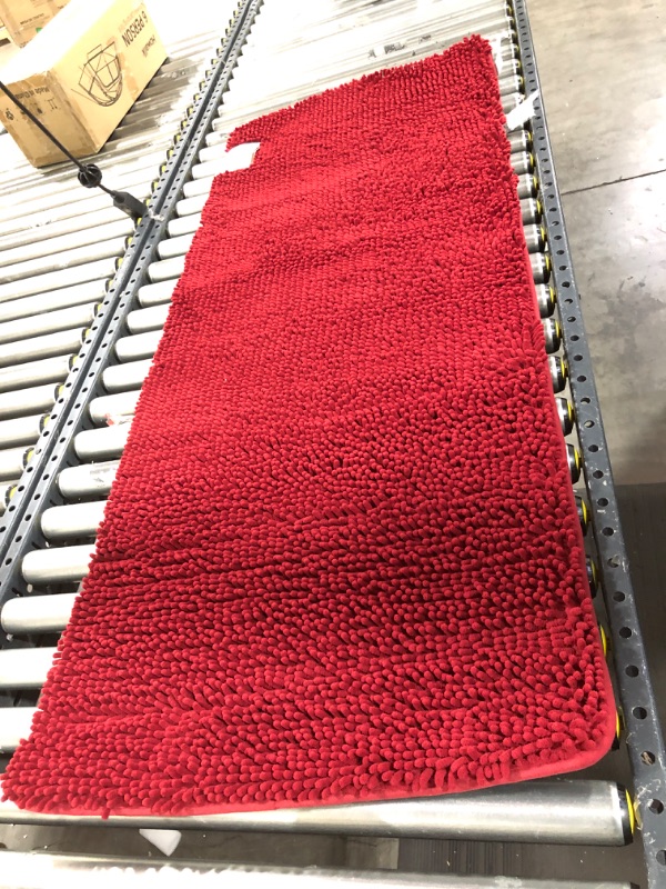 Photo 1 of 57x24in red bath mat 