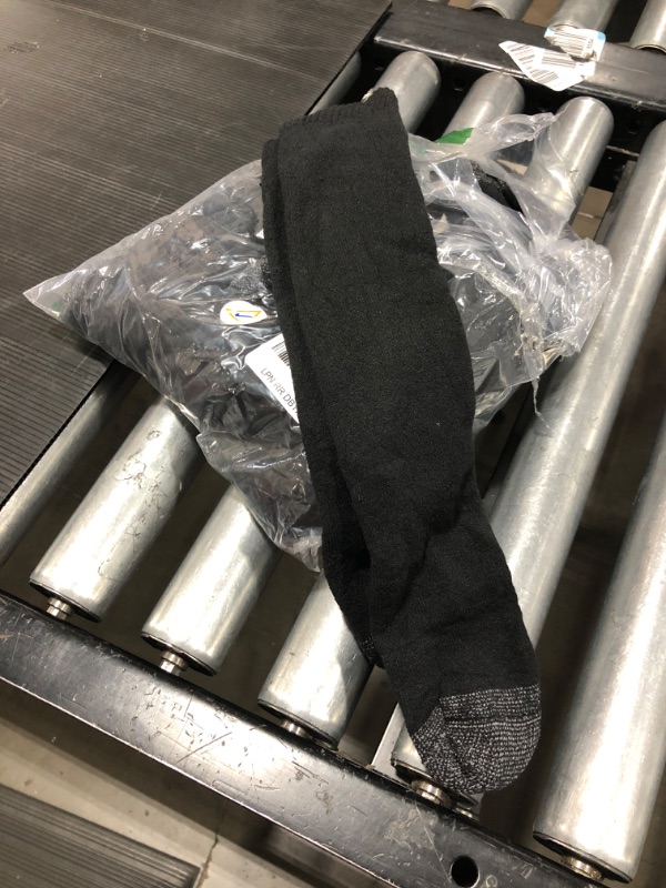 Photo 1 of 5 pair of Black Socks. Unknown Size