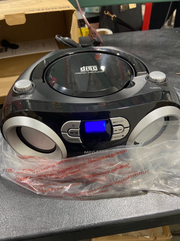 Photo 1 of MEGATEK Portable CD Player/Radio/Bluetooth Boombox with Enhanced Stereo Sound, CD-R/CD-RW/MP3/WMA Playback, USB Port, AUX Input, Headphone Jack, Backlit LCD Display, AC/Battery Operated
