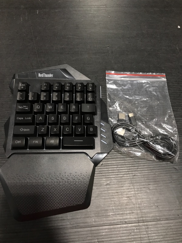 Photo 1 of RedThunder Wireless One-Handed Gaming Keyboard, 2.4Ghz RGB Backlit Mini Gaming Keypad, Rechargeable 2000mAh Battery for PC Gamer
