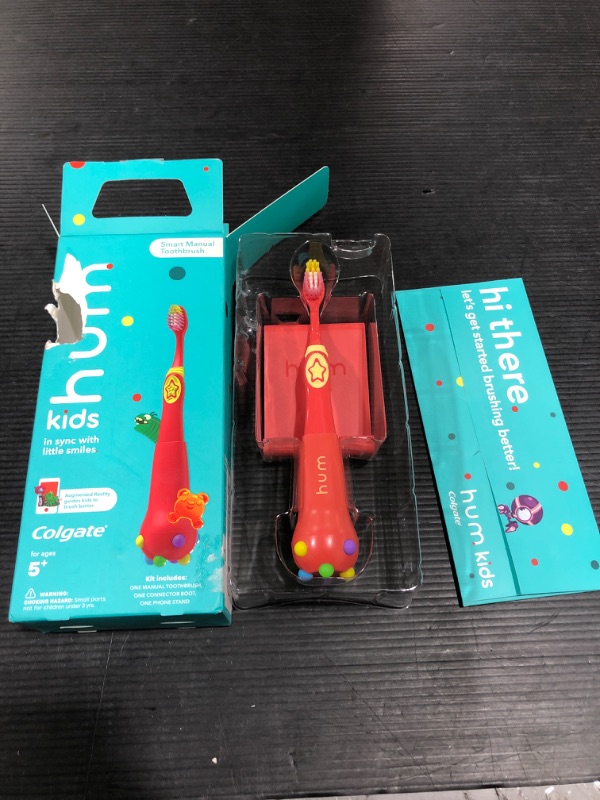 Photo 1 of Colgate hum Kids Smart Manual Toothbrush, Coral
