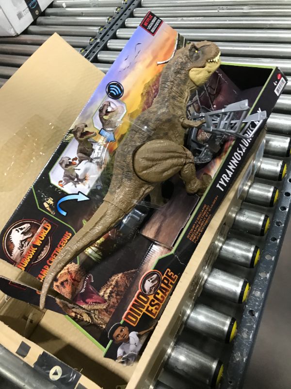 Photo 2 of ?Jurassic World Camp Cretaceous Dinosaur Toy, Stomp 'N Escape Tyrannosaurus Rex Action Figure with Stomping Motion??
