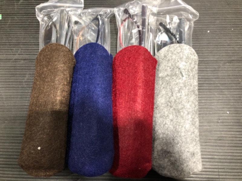 Photo 1 of 4 set of glasses with cases